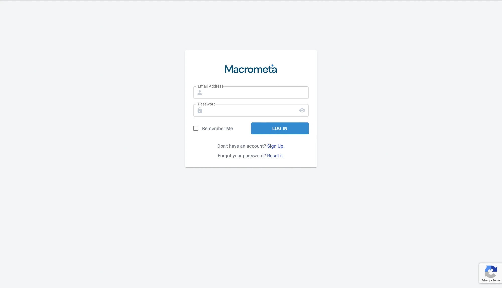 The old login: a small white card with email, password, Remember me and a Log in button, and a Sign up link underneath.