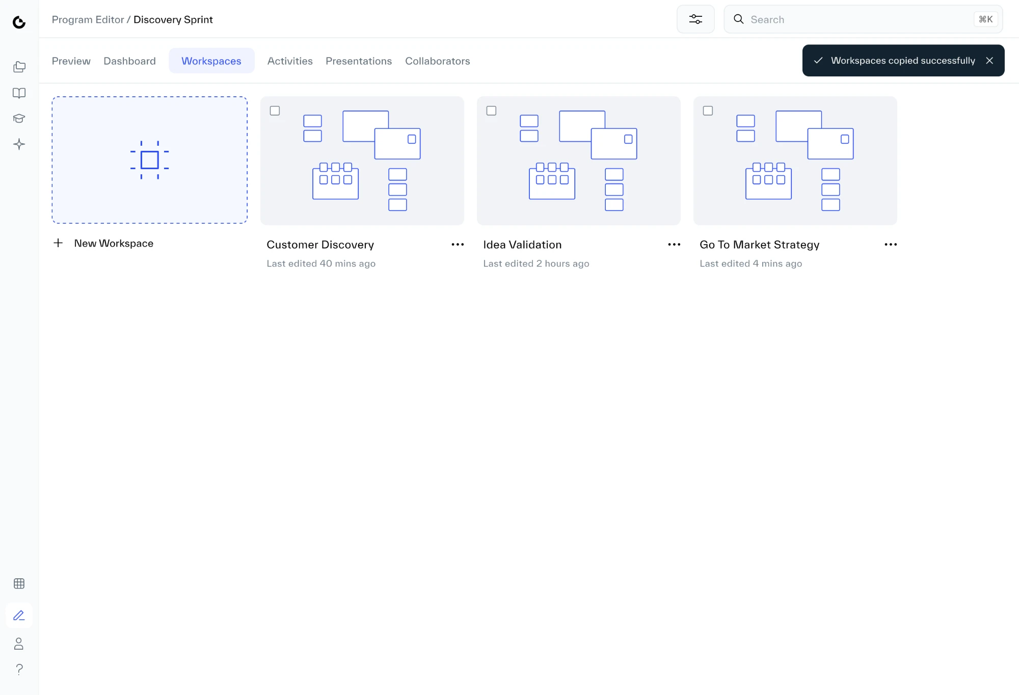 The workspaces page after copying. A dark message at the top right says workspaces copied successfully, with a close button. The checkboxes on the cards are cleared and the selection bar is gone.